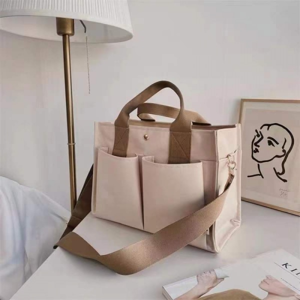 Babyväska i khaki canvas
