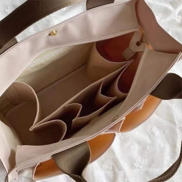 Babyväska i khaki canvas