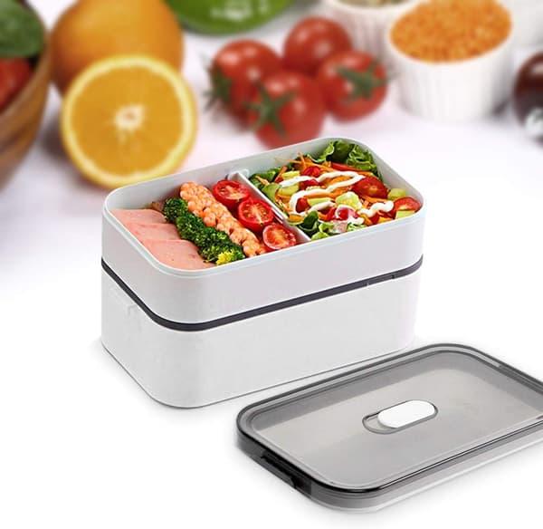 Bentoboks med hvit topp og oransje bunn, akryl