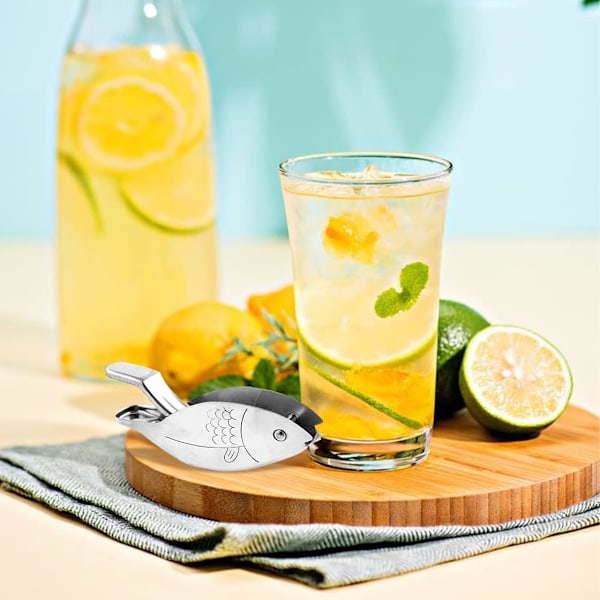 Manuel Citronpresser i Rustfrit Stål - Fisk Formet Citronpresser til Køkkenet - Til Appelsiner, Citroner og Lime