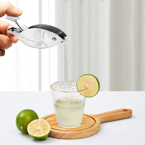 Manuel Citronpresser i Rustfrit Stål - Fisk Formet Citronpresser til Køkkenet - Til Appelsiner, Citroner og Lime