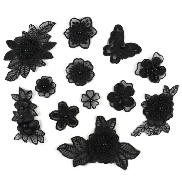 12 spetslappar, svarta broderade blomsnören på lappar Sy