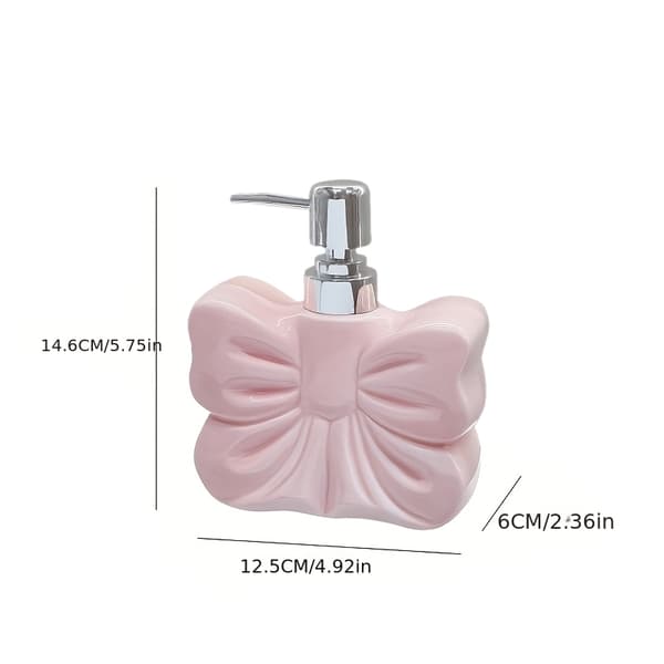 Buesformet sæbedispenserflaske, egnet til dispensering af shampoo på badeværelset. pink