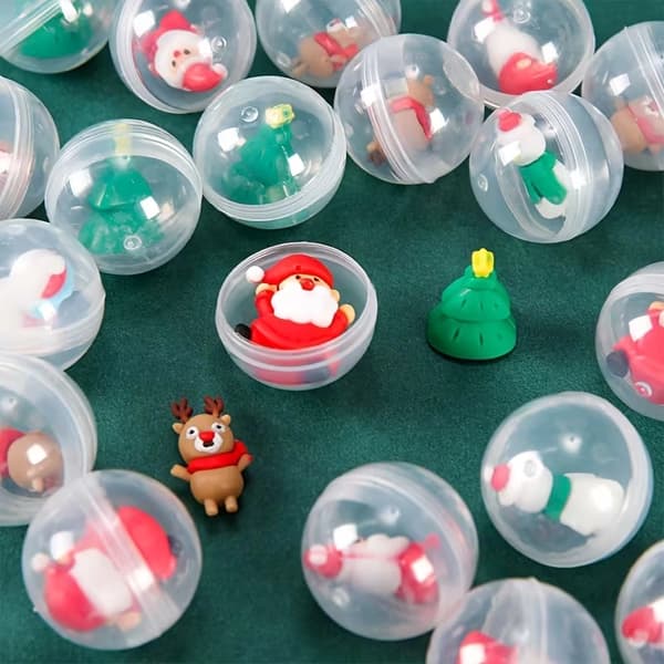 18-delars interaktiv överraskningsägg med jultomte och älg, små julgransprydnader