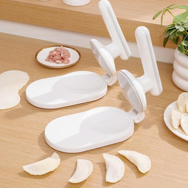 Dumplingforme, der bruges til dumplingindpakning, dejindpakning og tærtetryk. White