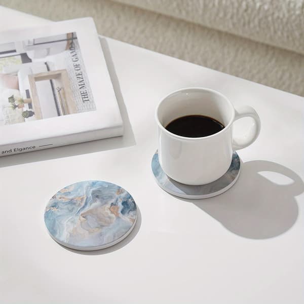 Et sæt med 6 abstrakte blå marmor coasters 6 items