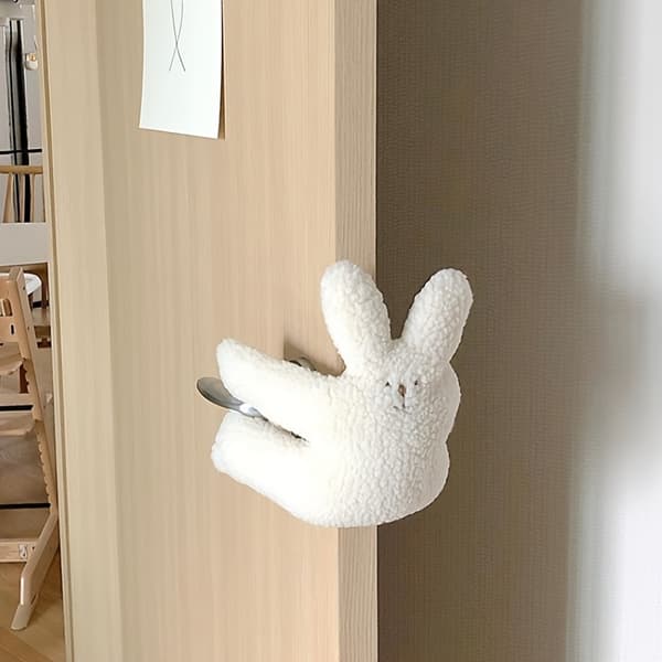 Dörrklämsskydd, infällbart dörrstopp för att förhindra att dörren smäller igen. White