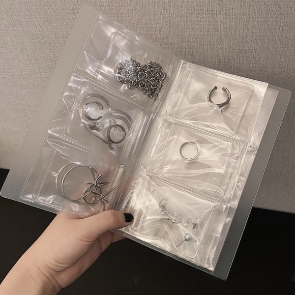 Smycken förvaringsbok Transparent plast presenter Smycken Organizer 3 grids 84 card slots