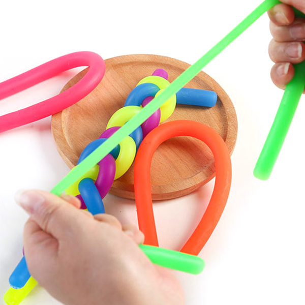 Stretchy Nudelsnöre Neon Kid Barn Fidget Toy Sensorisk leksak Yellow 1pcs