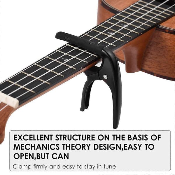 Bärbar gitarrkapo Professionell gitarrtonväxlare med gitarrplektrum för akustiska elgitarrer Ukulele Mandolin B