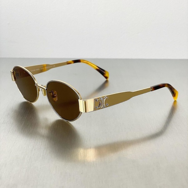 Fashionabla retro Arc De Triomphe solglasögon för kvinnor Golden Tea