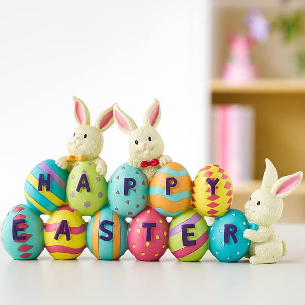 Happy Easter Table Decoration Rabbit and Easter Egg Figurine Table Decoration for the Easter Season.