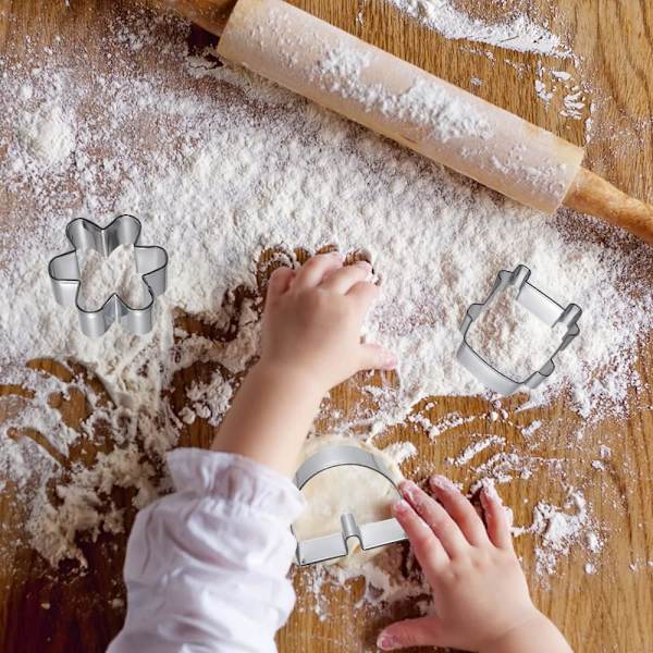 7 deler mini metall kakeutstikkersett - fredstegn Groovy baking