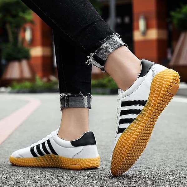 Golfpromenader, spikfria sneakers white black 9.5