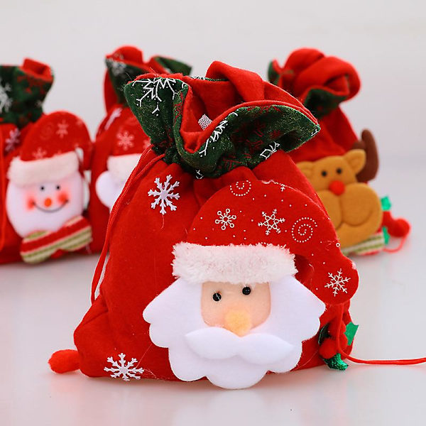 Fritidspose 4 stk. Julegavepose med snøre i non-woven stof Bærbar julegavepose med snøre Julegavepose i non-woven stof Julemandstegninger