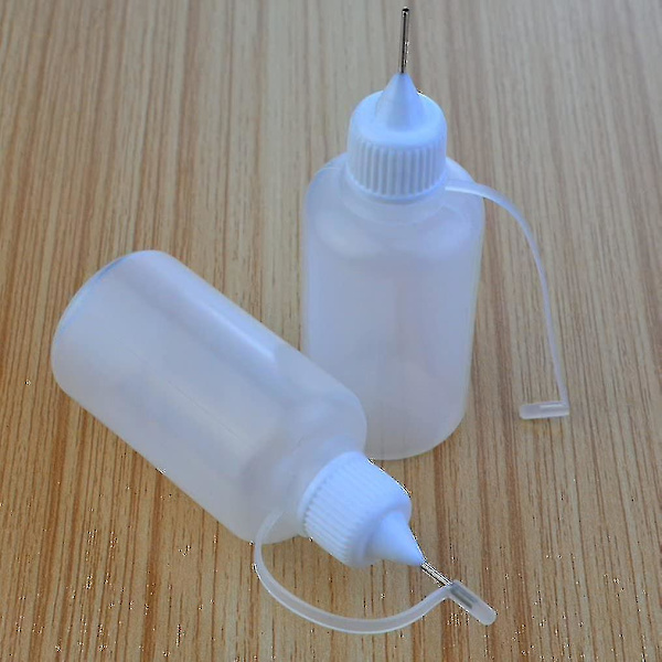 10 st 30 ml plastflaskor med spetsapplikator, påfyllningsbara droppflaskor med nålspetslock för lim