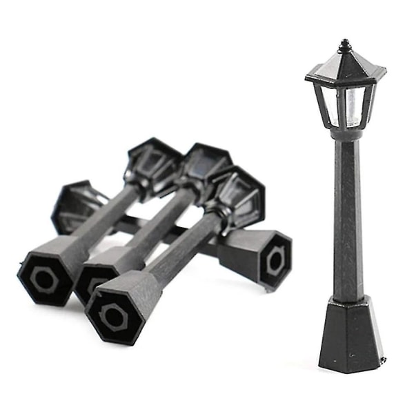 4 stk. Gatepostlys for modelljernbane