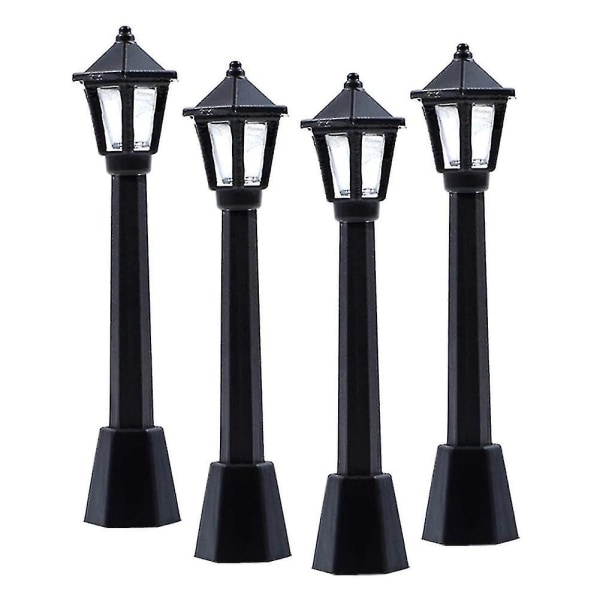 4 stk. Gatepostlys for modelljernbane