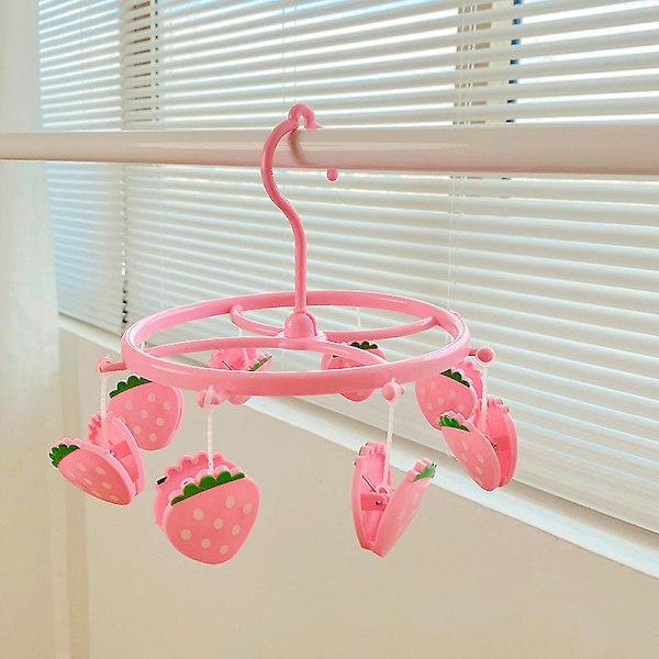 Liten rosa jordgubbsformad torkställning i plast för strumpor, underkläder och överärmar - Hem, studentboende