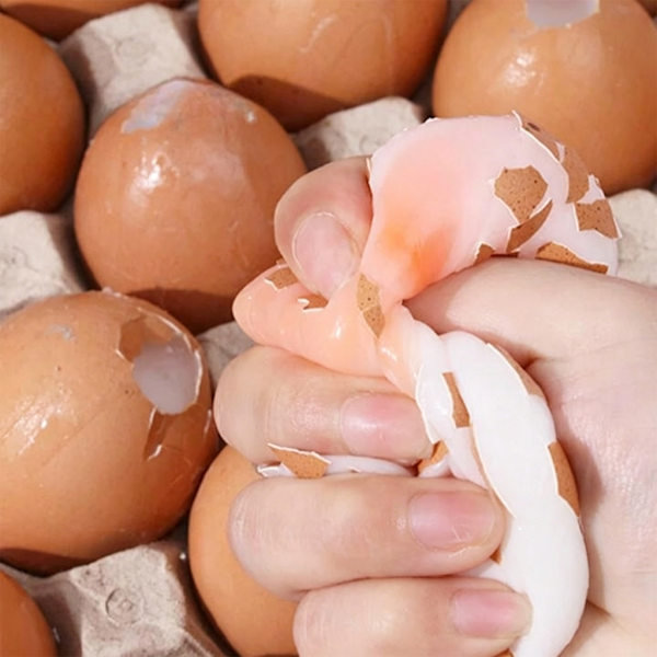 Interaktivt simuleringsæg klemmelegetøj til voksne børnefester Egg