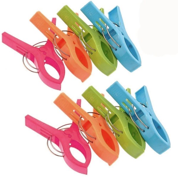 TRIXES Förpackning med 8 stora, ljusa färgade strandhanddukspinnar i plast, clips till solsäng