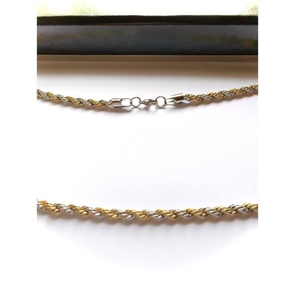 Halsband i rostfritt stål med 18k guldplätering.