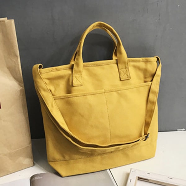 Solidfarget crossbody-veske i canvas for jenter. En skulderveske i canvas, bærbar studentveske