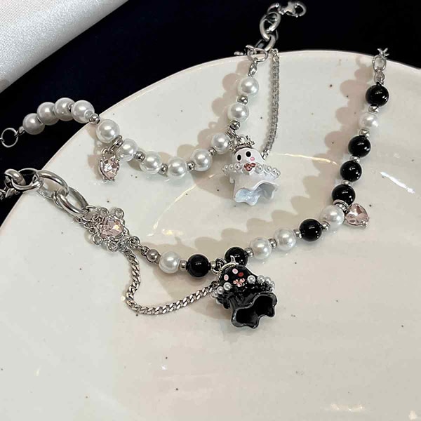 4 stk. sorte og hvide små spøgelses-perle armbånd Sød Cool Spice håndsmykker