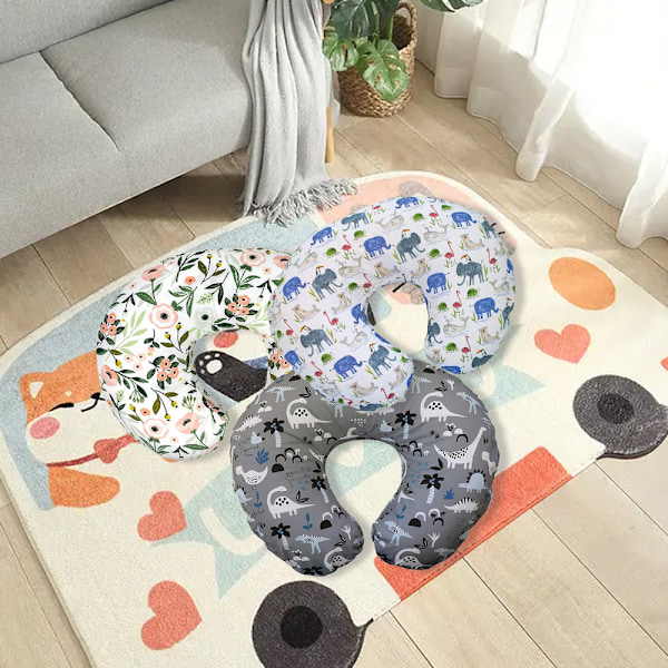 Imeväispojalle tai -tytölle: Maapähkinänkuoren muotoinen imettämispehmusteen suojapäällinen | SHOPBOP dinosaurukset ja tummansiniset pisteet