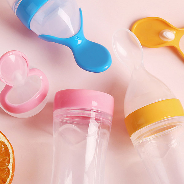 Babymatningsflaska med klämfunktion för flingor, silikonmatningssked med dammskydd
