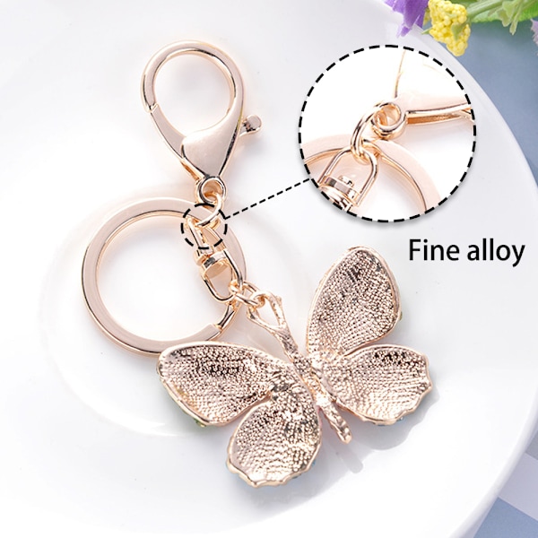 Söt fjärilsformad kristallrhinestone gnistrande nyckelring väska hänge handväska charm för kvinnor flickor