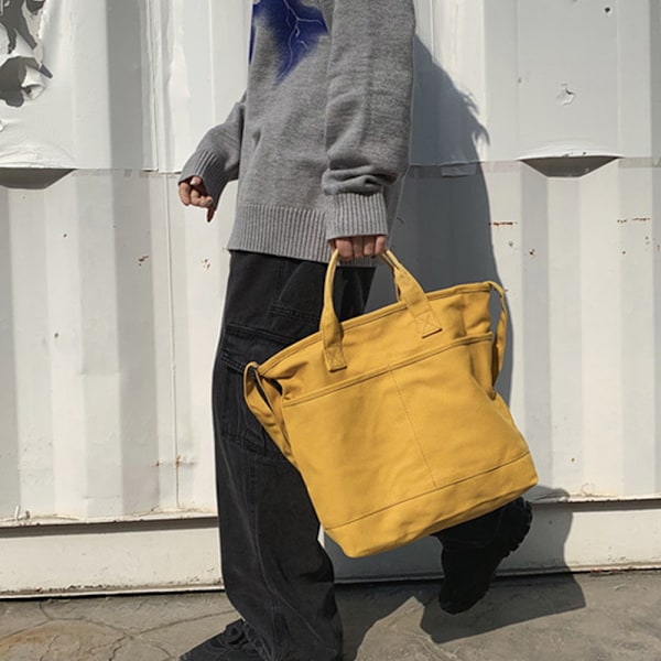 Solidfarget crossbody-veske i canvas for jenter. En skulderveske i canvas, bærbar studentveske