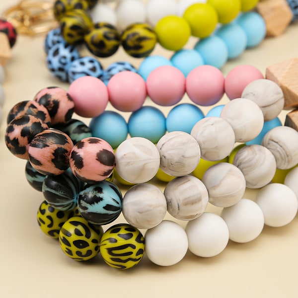 Silikon armbånd med treperler og PU-lær nøkkelring