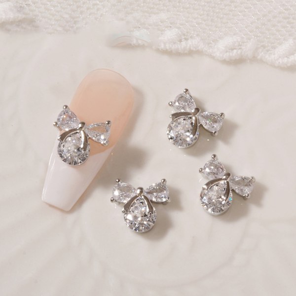 12 kpl Jousi Solki Kynsi Alloy Rhinestones Kynsiin Kit Jousi Solmio Kynsi Kristallit Akryyli Kynnet Helmiä Rhinestones Kynsi Taidetta