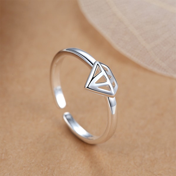 S925 sterling silver kattöronöppning svansring klor omger varandra