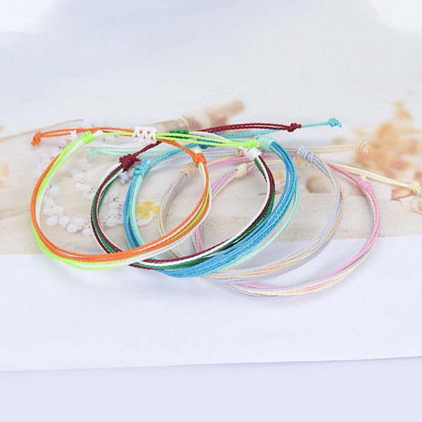 12 stycken flerfärgade strängflätade armband, vattentäta armband för kvinnor, smyckesset