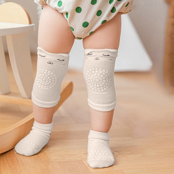 Babykryp-knäskydd och halkfria strumpor för småbarn