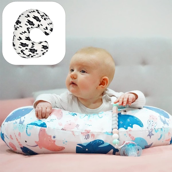 Ammingspute, støtte for babyens hode og kropp under amming og sitting