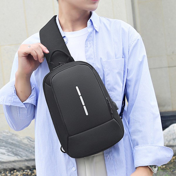Stöldskyddande Crossbody Sling Bag, Bröst Ryggsäck Laddning, Axelväska för Män Kvinnor