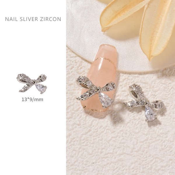 8 kpl Jousi Soljetta Kynsi Alloy Charms Strassit Jousi Solmio Kynsi Kristallit