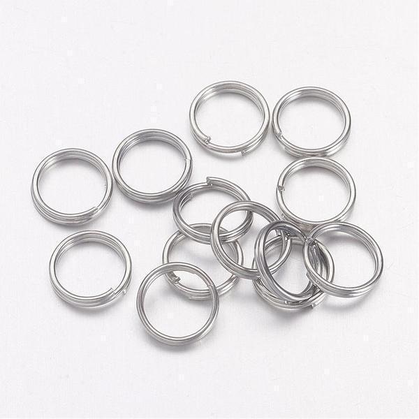 10 gr.(Drygt 120 st)Dubbla säkerhetsringar 7 mm. i ytterdiameter 1 Silver