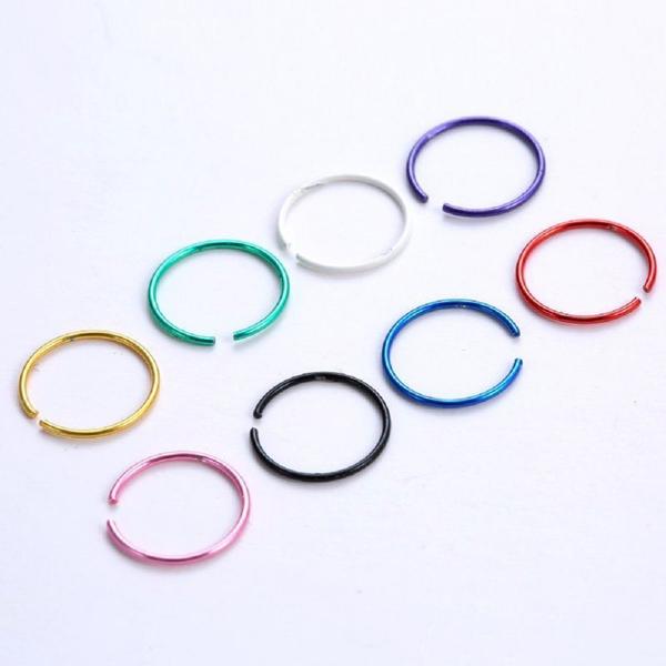 8 st. Piercing ringar i färgad 316 stål (8 olika färger)