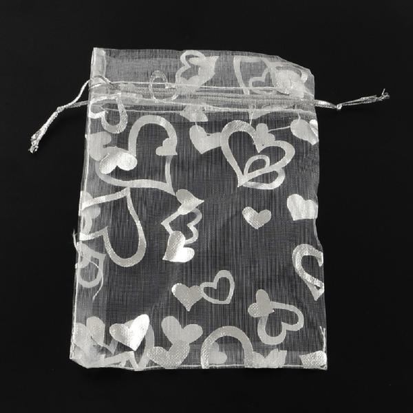 10 st. Organza påsar c.a 12x10 cm. Vita med silverhjärter