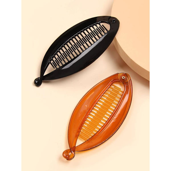 2 Fiskformade spänne 1 Svart +1Amberi ABS Plast 5X12 cm.