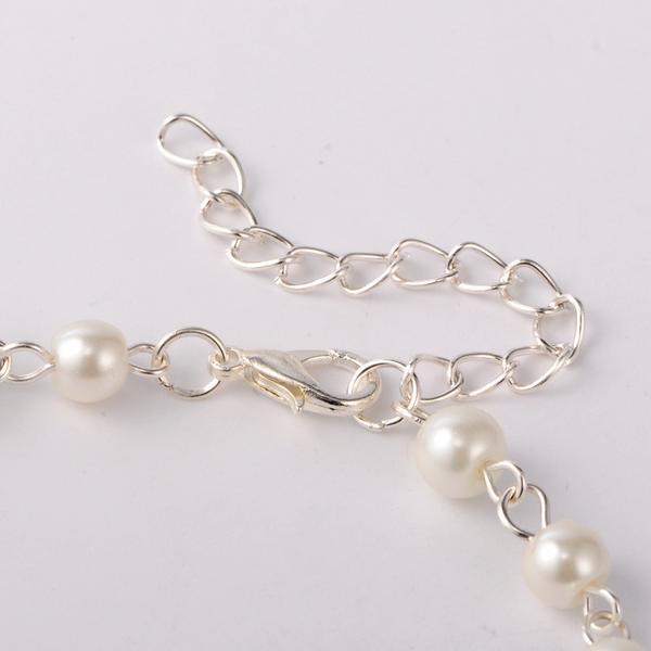 Silverpläterad Vristlänk med vita pärlor , 230 mm. lång