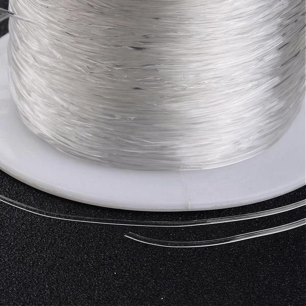 1 rulle  100 mt. transparent elastisk tråd 0,6 mm. Ø