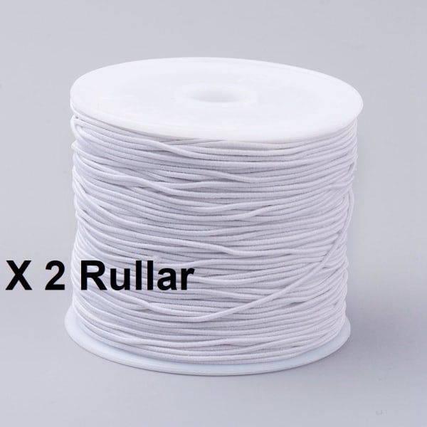 2 Rullar med  c:a 24-27 mt Vit nylonklädd elastisk tråd 0,8 mm