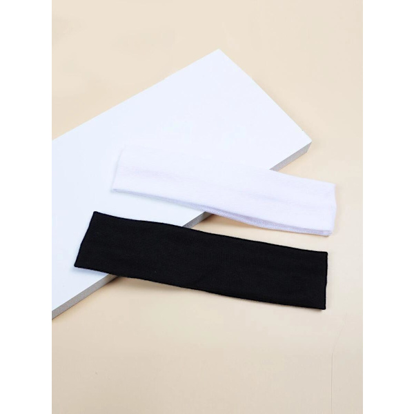 2 Stretch hårbånd i polyester C:a 5~6 x 20 cm- 1 svart 1 hvit