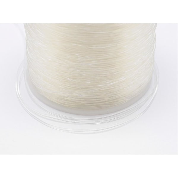 Stor rulle på 100 mt. transparent elastisk tråd 0,6 mm. Ø