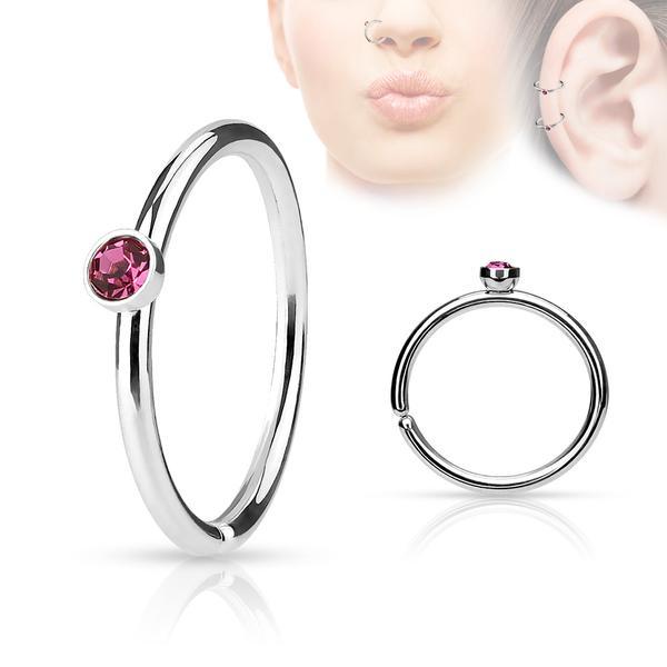 Piercing ring i 316L kirurgisk stål med pink cubic zirconia